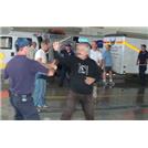 Participants pair off for two-person exercises.